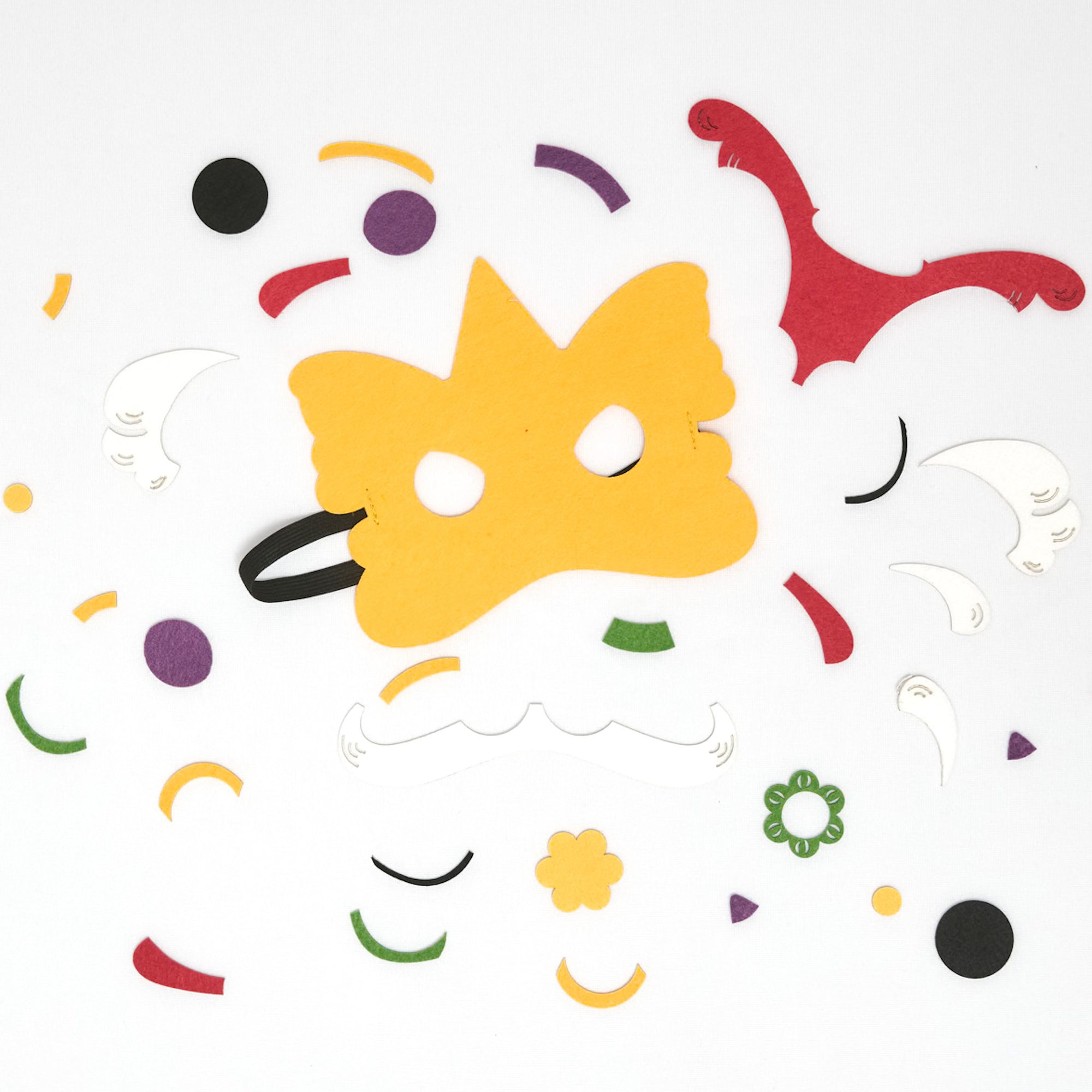 DIY craft kit featuring materials to make two felt lion dance masks, perfect for Lunar New Year celebrations and imaginative play.