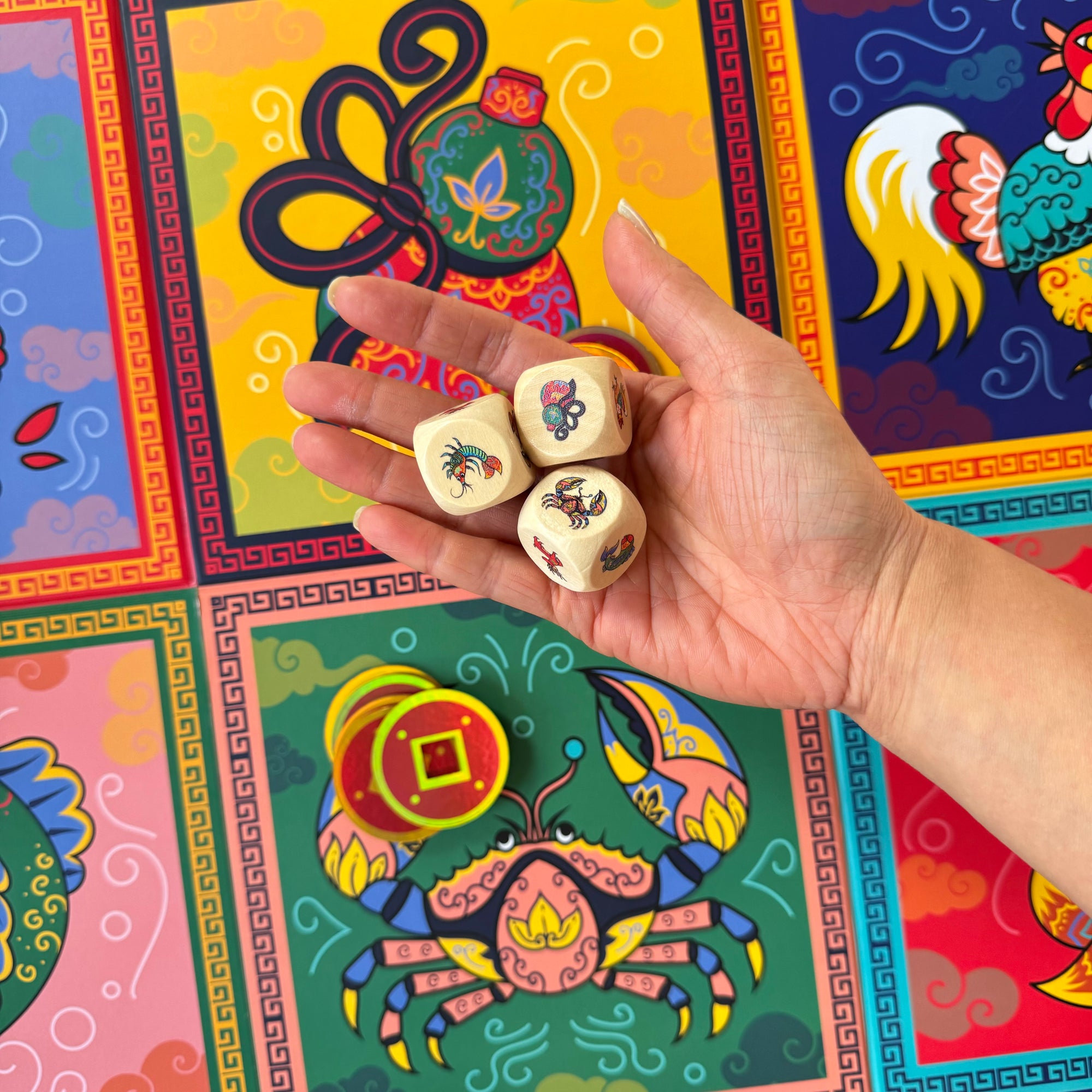 Celebrate Vietnamese Lunar New Year with Bầu Cua Tôm Cá, a beloved family board game of luck and tradition! Incudes board, 3 dice, and tokens for play.