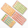 Set of colorful wooden Mahjong tiles for kids with various patterns on a white background