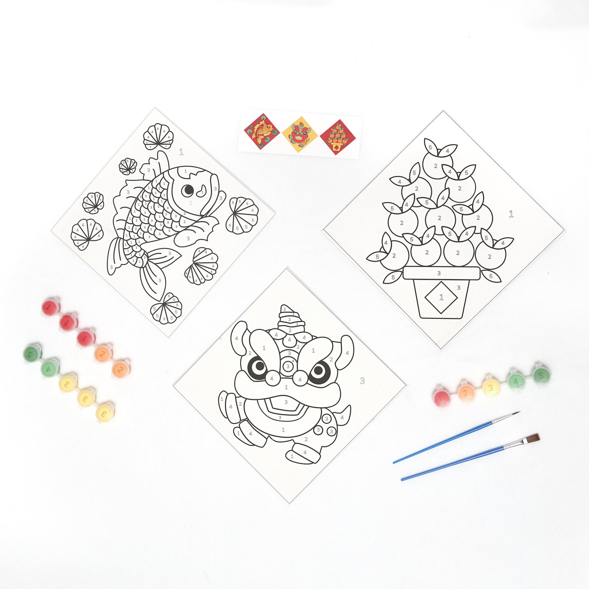 Paint-by-number kit featuring Lunar New Year symbols—fish, oranges, and a lion dance—with canvases, paints, and brushes for creative fun.