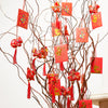 Chinese zodiac ornament set hung on branches