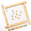 Wooden mahjong tiles with colorful designs on a white background